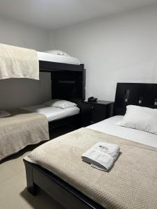 Hotel Palmeras De Mariana客房内的一张或多张床位