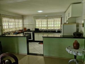 Køkken eller tekøkken på Chácara Bons Companheiros