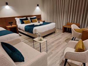 Postel nebo postele na pokoji v ubytování 3M Hostel & Suites