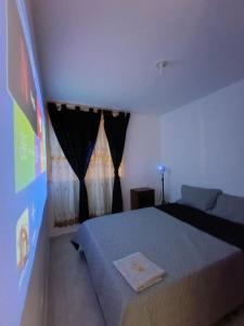 Postel nebo postele na pokoji v ubytování Apartamento Amoblado con Excelente Ubicación