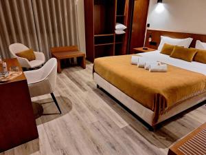 Postel nebo postele na pokoji v ubytování 3M Hostel & Suites