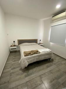 Ένα ή περισσότερα κρεβάτια σε δωμάτιο στο Casa nueva a estrenar