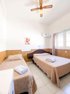 Ένα ή περισσότερα κρεβάτια σε δωμάτιο στο Hotel Atlantico