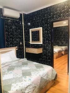 Voodi või voodid majutusasutuse Cairo hotel toas