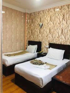Voodi või voodid majutusasutuse Cairo hotel toas