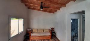 Postel nebo postele na pokoji v ubytování Quincho Lo de Fausto + 10 fotografií