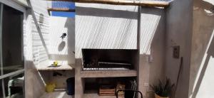 TV a/nebo společenská místnost v ubytování Quincho Lo de Fausto