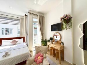 Postel nebo postele na pokoji v ubytování My My House Đà Lạt