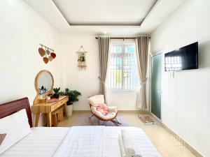 TV a/nebo společenská místnost v ubytování My My House Đà Lạt