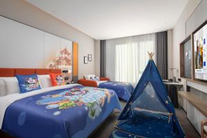 Hampton by Hilton Baoding High-tech Zone 객실 침대