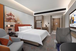 Hampton by Hilton Baoding High-tech Zone 객실 침대