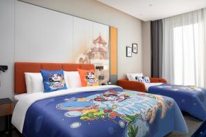 Hampton by Hilton Baoding High-tech Zone 객실 침대