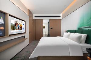 Hampton by Hilton Baoding High-tech Zone 객실 침대