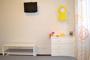 TV a/nebo společenská místnost v ubytování B&B Un mare di Gioia