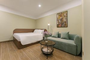 An Nguyen Lakeside Residence客房内的一张或多张床位