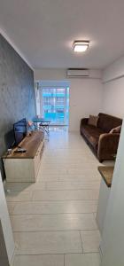 TV a/nebo společenská místnost v ubytování Sab Luxury Apartments