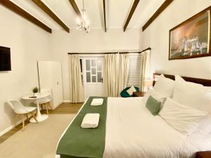 Ένα ή περισσότερα κρεβάτια σε δωμάτιο στο Estate Haven +13 φωτογραφίες