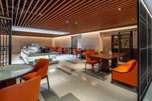 Predel za sedenje v nastanitvi Xinghuacun Hotel