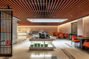 Predel za sedenje v nastanitvi Xinghuacun Hotel