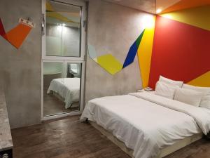 Ένα ή περισσότερα κρεβάτια σε δωμάτιο στο Hotel Star