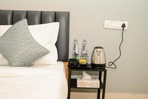 Postel nebo postele na pokoji v ubytování Bee Oak Budget Hotel