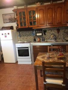 Kuchyň nebo kuchyňský kout v ubytování Mitsani Country House + 20 fotografií