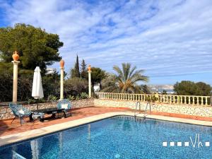 Bazén v ubytování VH CostaBlanca - GRANADELLA nebo v jeho okolí