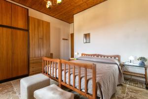 Postel nebo postele na pokoji v ubytování Villa Angelina