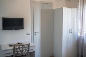 TV a/nebo společenská místnost v ubytování B&B Benvenuti al Sud