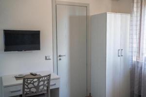 TV a/nebo společenská místnost v ubytování B&B Benvenuti al Sud