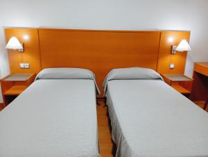 Postel nebo postele na pokoji v ubytování Torrejoven