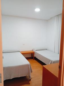 Postel nebo postele na pokoji v ubytování Torrejoven