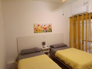 Postel nebo postele na pokoji v ubytování Maisonette JP2