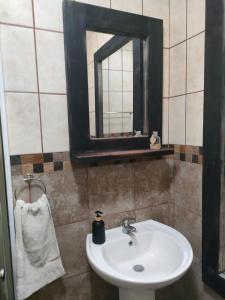 Ein Badezimmer in der Unterkunft Leopard Tree Guesthouse