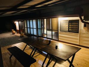 Istumisnurk majutusasutuses 広い畳間と外には広いウッドデッキCondominium和風邸Yanbaru