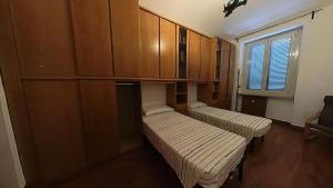 A bed or beds in a room at BnB Regina