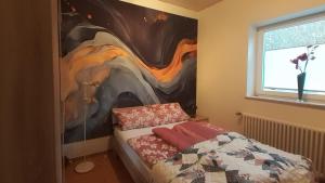 Postel nebo postele na pokoji v ubytování Ferienappartement in der Spielestadt