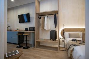Postel nebo postele na pokoji v ubytování Nomad Haux Mestalla Room 101