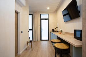 Kuchyň nebo kuchyňský kout v ubytování Nomad Haux Mestalla Room 101