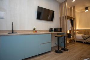 TV a/nebo společenská místnost v ubytování Nomad Haux Mestalla Room 101
