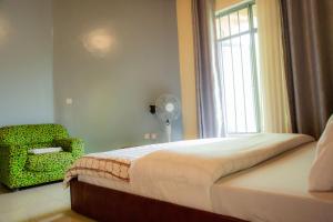 Voodi või voodid majutusasutuse The Vista Homes Kibagabaga toas