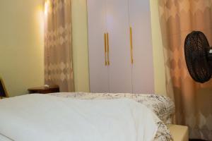 Voodi või voodid majutusasutuse The Vista Homes Kibagabaga toas
