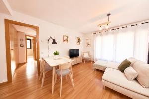 Μια τηλεόραση ή/και κέντρο ψυχαγωγίας στο Apartamento Escalona Ordesa