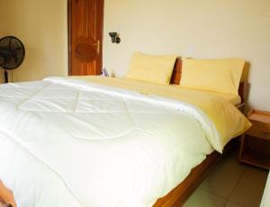 Voodi või voodid majutusasutuse The Vista Homes Kibagabaga toas