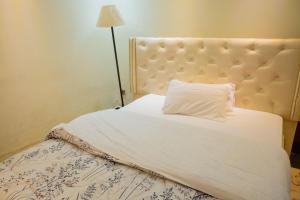 Voodi või voodid majutusasutuse The Vista Homes Kibagabaga toas