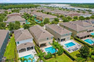 an aerial view of a resort property with swimming pools at GREAT HOUSE Near Disney, Private Pool in Orlando