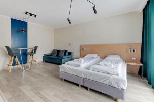 Posteľ alebo postele v izbe v ubytovaní Apartments Old Town Angielska Grobla & by Noclegi Renters