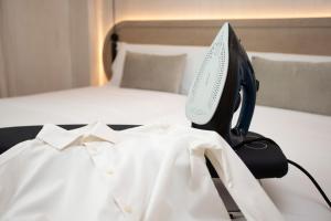 Postel nebo postele na pokoji v ubytování Nomad Haux Mestalla Room 101