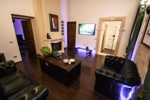 Μια τηλεόραση ή/και κέντρο ψυχαγωγίας στο Reco Luxury Suite Rome +19 φωτογραφίες