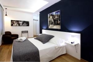Voodi või voodid majutusasutuse Quintocanto Hotel & Spa toas